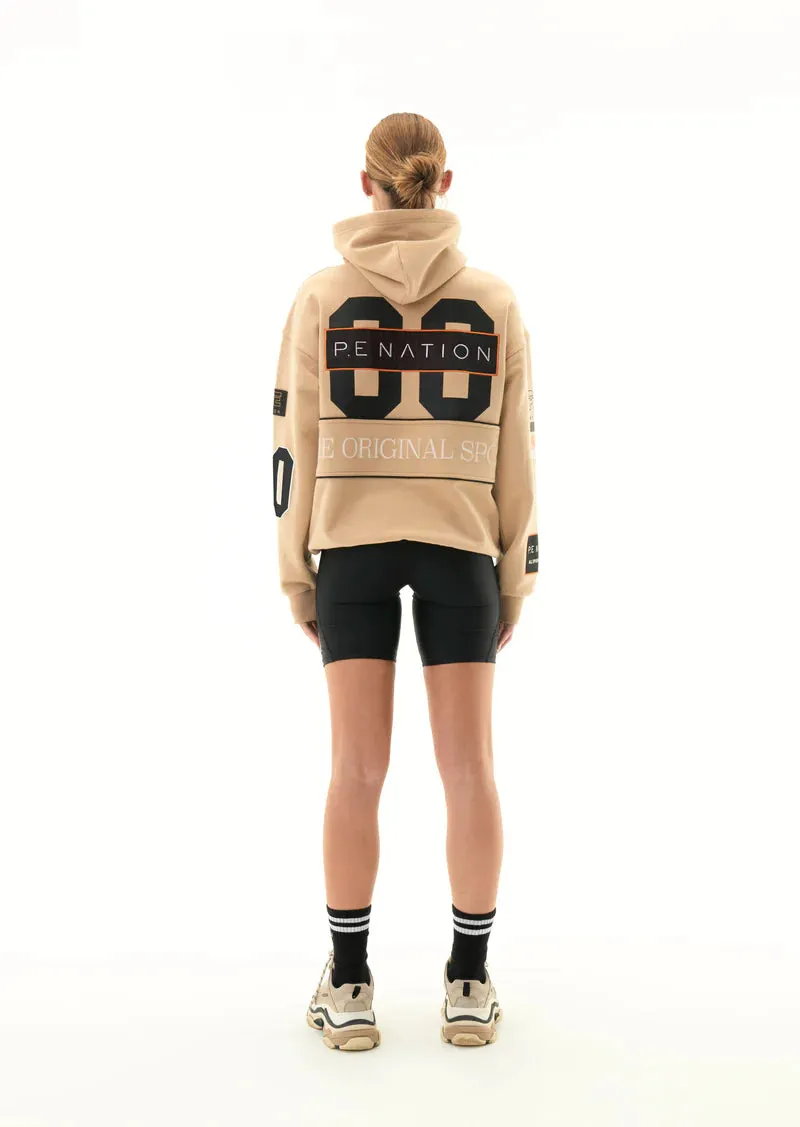 DEFENDING CHAMPION HOODIE IN BEIGE