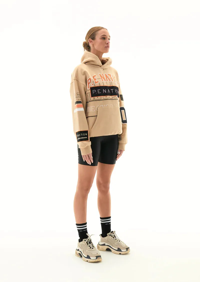 DEFENDING CHAMPION HOODIE IN BEIGE